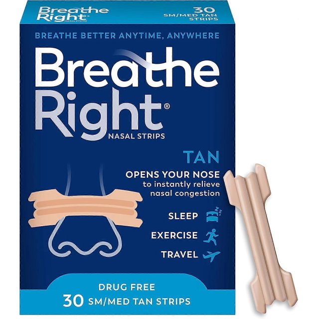 tan nose strips | helps stop snoring | drug-free anti-snoring solution for cold caja frontal azul con 30 tiras nasales tan (SM/MED) tal como indica el título; muestra el nombre grande en blanco, ilustración de nariz y dos tiras tan a la derecha; texto señala alivio de congestión nasal y uso para sueño, ejercicio y viaje; material ajustado y sin fármacos; a menudo se usan también para facilitar la respiración en viajes cortos.