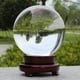 thumbnail image 5 of Bola de cristal de 150 mm, bola de cristal transparente, bola de cristal artificial, bola de cristal curativa mágica, bola de lente con soporte de madera, 5 of 5