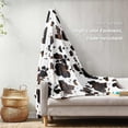 thumbnail image 3 of Cozy Bliss Cow Print Throw Blanket Non Shedding MilkyPlush™ Fleece 330GSM Thick Blankets Western Room Decor Super Soft Warm for Adults Kids Girl Gifts Bedroom Couch Sofa Travel Black Brown 50"x60", 3 of 5
