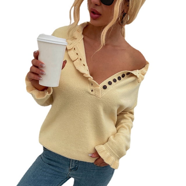 Suéter amarillo de cuello redondo y manga larga con detalle de botones y detalle de hongos, talla S