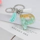 thumbnail image 2 of Llavero de letras con borlas verdes | Colgante de cristal acrílico | Lámina de oro, pegamento en gota, joyería de piedra engrosada | Amuleto de bolso con estilo, accesorio para mochila | 1 pieza, 2 of 2