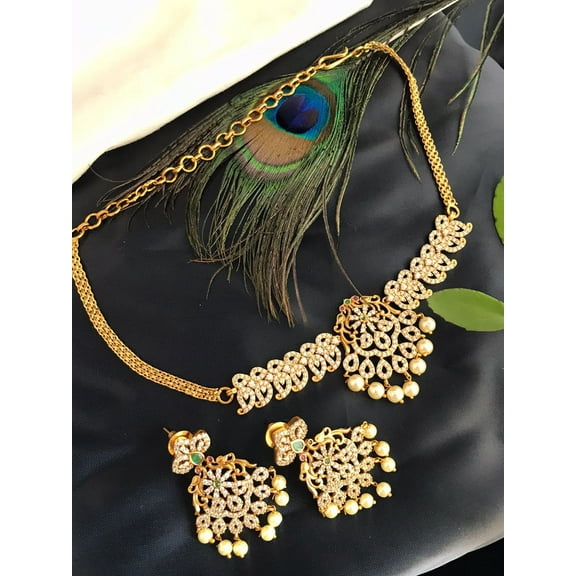 Peacock Matte Gold Finish Haram Necklace Set – South Indian Temple Jewelry with White & Green CZ Stones