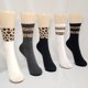 thumbnail image 4 of Calcetines de tubo medio con estampado de leopardo manchado para mujer, estilo japonés, otoño, primavera, verano, moda, novedad, 4 of 4