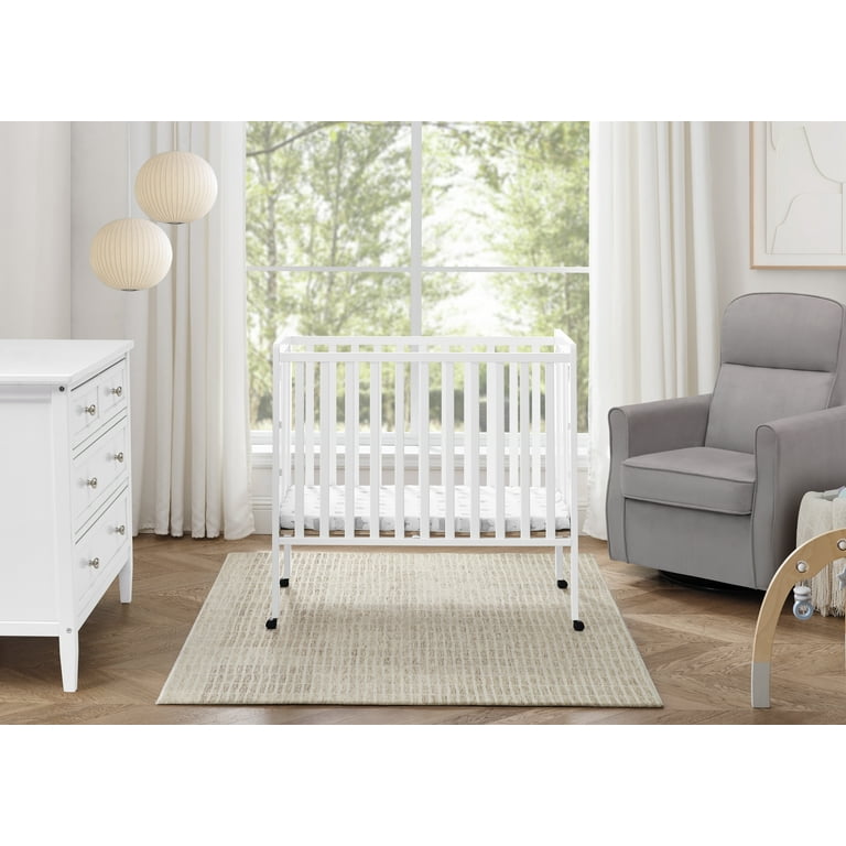 Delta Children Lee Portable Folding Mini Crib with 1.5-Inch Mattress - Greenguard Gold Certified, Bianca White