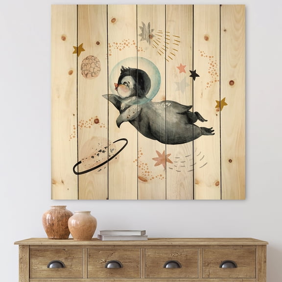 Designart 'Little Penguin Flying Planets and Stars II' Farmhouse Print on Natural Pine Wood