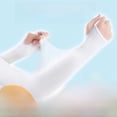 thumbnail image 1 of Manga de hielo para protección solar, manga de seda helada para mujer, manga de protección solar para verano, ciclismo, viajes, protección para el brazo, manga de hielo, 1 of 3