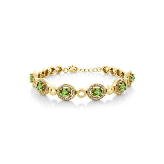 Gem Stone King 18K Yellow Gold Plated Silver Green Peridot Tennis Bracelet for Women (7.32 Cttw, Oval 7X5MM, 7 inch with 1 inch Extender)
