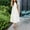 White, variant on Women's Summer Casual Flutter Short Sleeve Crew Neck Smocked Elastic Waist Tiered Midi Dress Comfy Summer Dresses Women Vintage Dress Maxi Dress Summer Maxi Dress with Sleeves Women Party Dress T