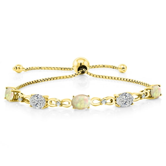 Gem Stone King 18K Yellow Gold Plated Silver White Ethiopian Opal and Lab Grown Diamond Bracelet for Women | 2.97 Cttw | Gemstone October Birthstone | Oval Cabochon 7X5MM | Fully Adjustable 9 inch