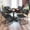 Brown, variant on Regency Kobe 36" Round Breakroom Table- Cherry & 4 Zeng Stack Chairs- Blue