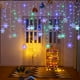 thumbnail image 1 of Cortina de luces LED con forma de copo de nieve, tira de luces de hielo para decoración de exteriores, cadena de luces de cono de hielo, cadena de luces de mariposa, luces para vestidos navideños, 1 of 5