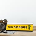 thumbnail image 2 of I Run This Rodeo, Yellow Black Frame Desk Sign (2 x 8"), 2 of 3