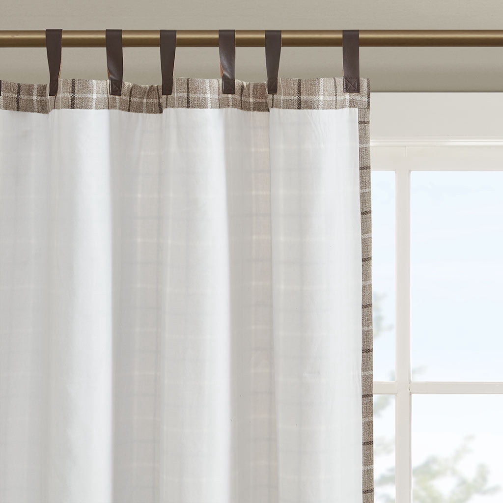 Madison Park Anaheim Plaid Faux Leather Tab Top Curtain Panel with Fleece Lining in Brown, 50"x84"