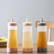 thumbnail image 4 of Botellas exprimibles para condimentos ZENMELE, botella vacía de 350 ml con tapa giratoria, a prueba de fugas, ideal para kétchup, mostaza, jarabe, salsas, aderezos, aceite, manualidades, sin BPA., 4 of 5