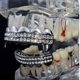 thumbnail image 4 of Vampire Fang Grillz Set Two Row Silver Tone Top Fangs & Bottom Teeth Bling Grills, 4 of 5