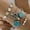 26710blue, variant on Womens Bracelet Set Electroplated Alloy Fashion Jewelry Collection Turquoise Leaf and Bow Geometric Design Hand Jewelry