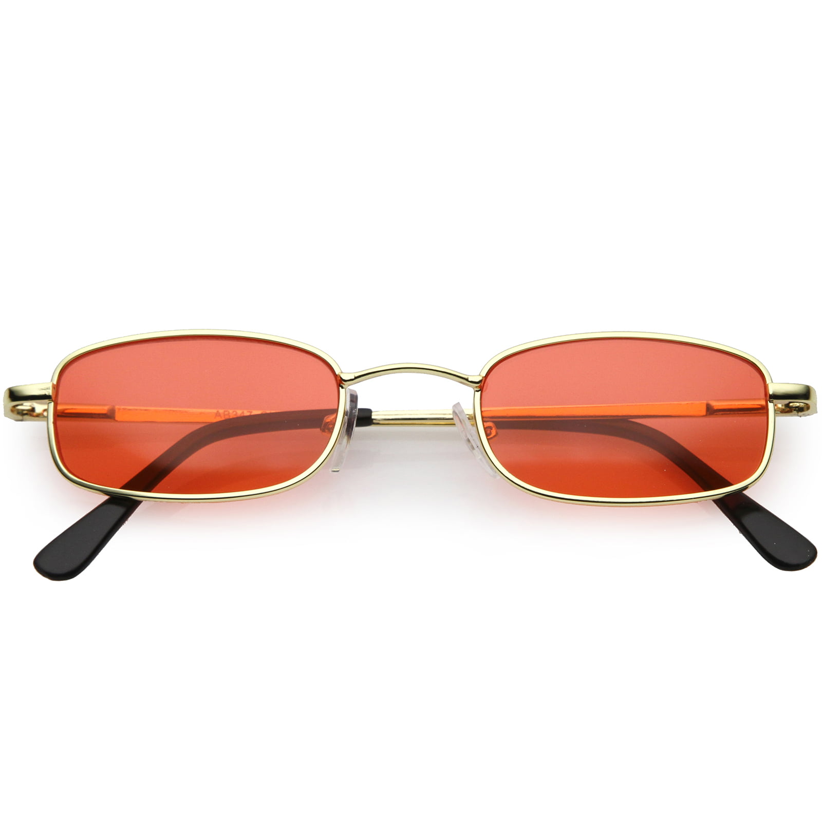 5 angled subtle hexagon lenses with gunmetal trim and arms and vivid amber lenses Y2K vintage frameless orange sunglasses 2000s NOS