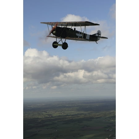 Fokker DVII World War I replica fighter in the air Stretched Canvas - Daniel KarlssonStocktrek Images (24 x