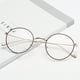 thumbnail image 4 of Qarigey Gafas redondas de metal para hombres y mujeres que bloquean los ojos de luz azul gafas anti luz azul gafas redondas Lentes Negro, 4 of 6