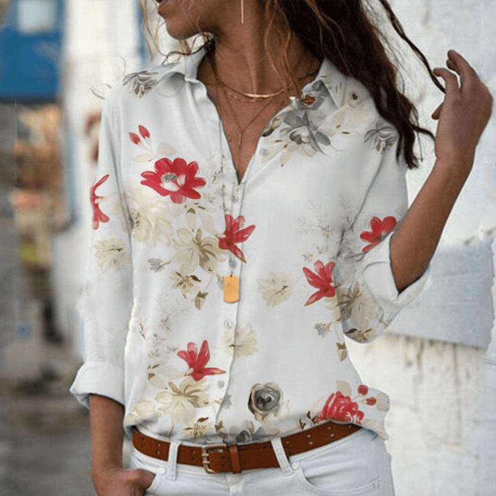 blusa blanca con flores rojas