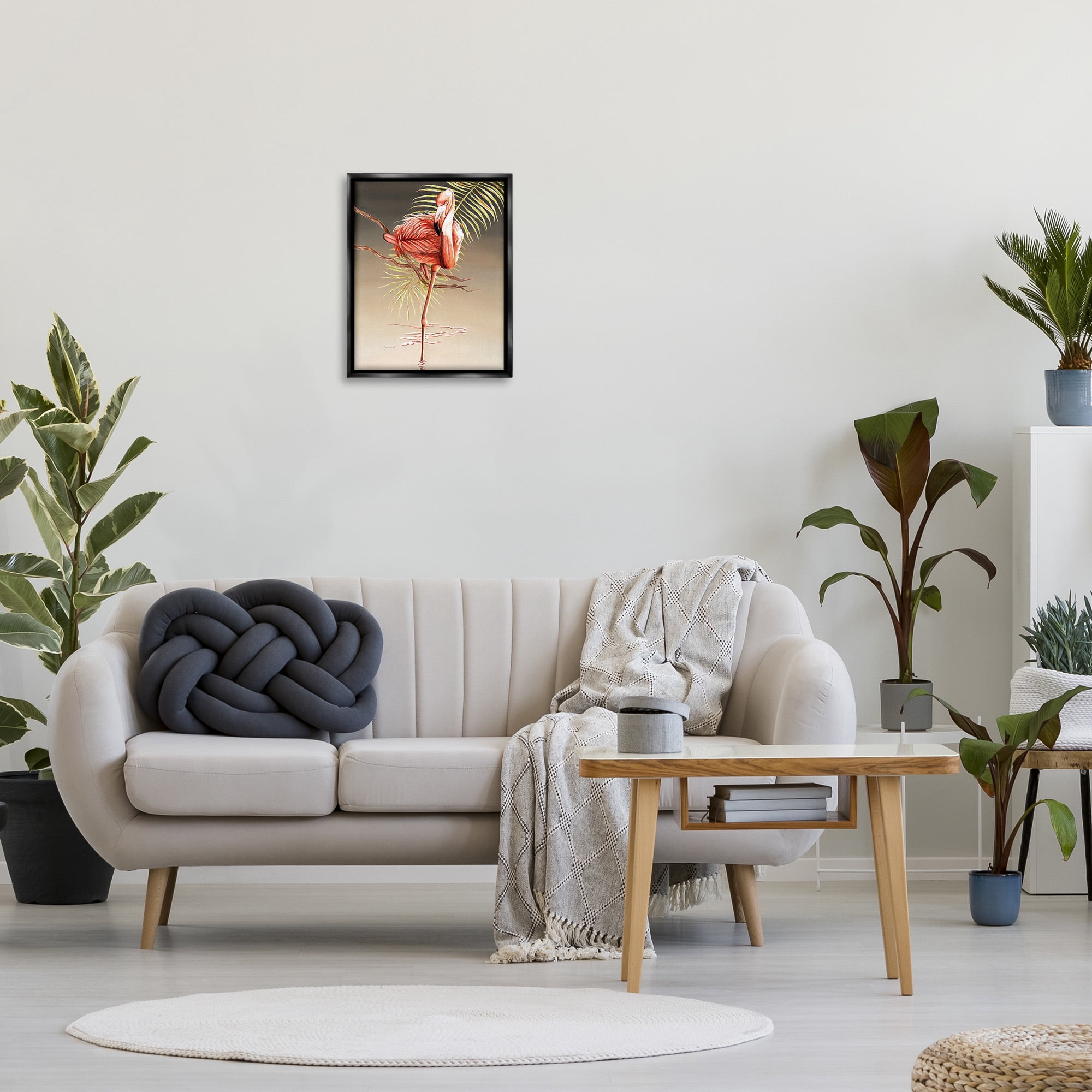 Stupell Industries Flamingo Balancing with Leaf Animals & Insects Painting Black Floater Framed Canvas Art Print Wall Art, 17 x 21