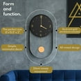thumbnail image 2 of Driini Modern Pendulum Wall Clock - Decorative and Unique Metal Frame, with 8 Inch Face - Contemporary, Minimalist Design, with Silent Battery Operation - Includes Both Black and Gold Pendelum, 2 of 7