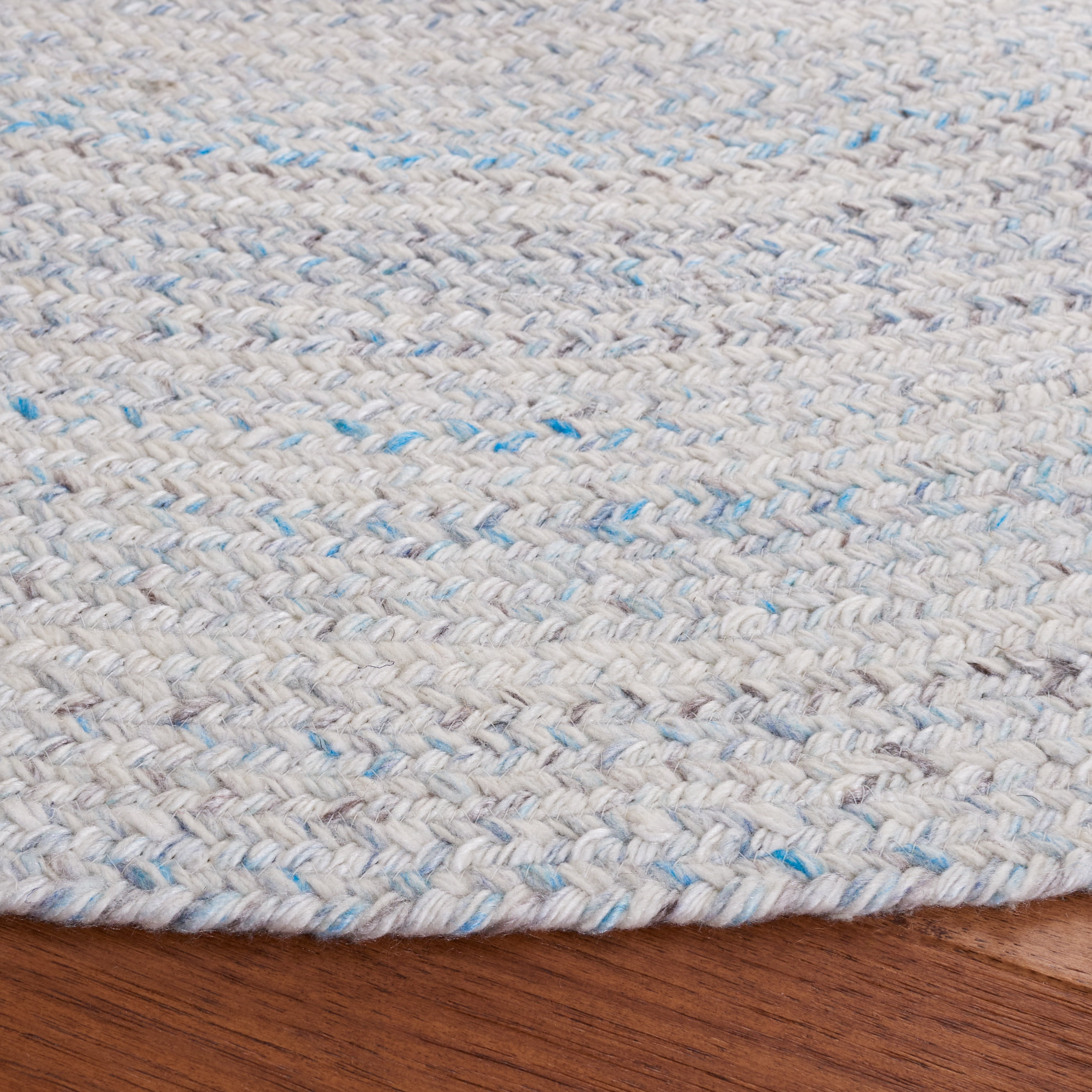 SAFAVIEH Braided Lyla Solid Polyester Reversible Area Rug, Ivory/Light Blue, 3' x 3' Round