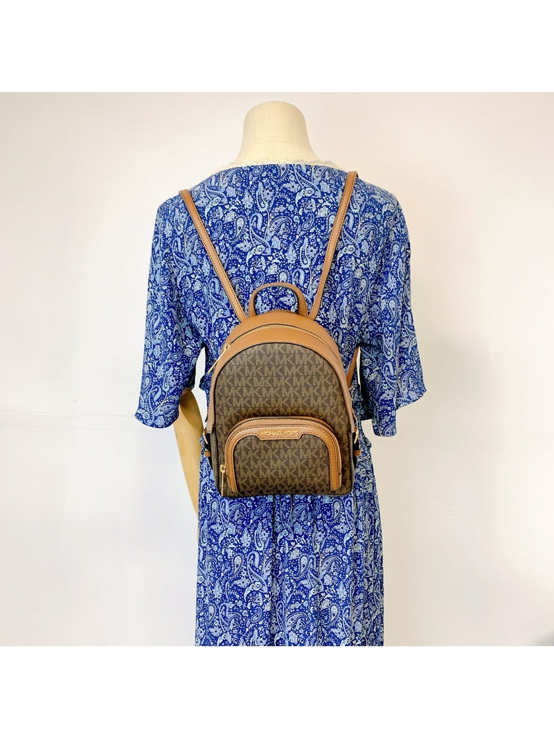 MICHAEL KORS ブラウンミニリュック Michael Kors Jaycee XS Signature PVC and Leather Sling