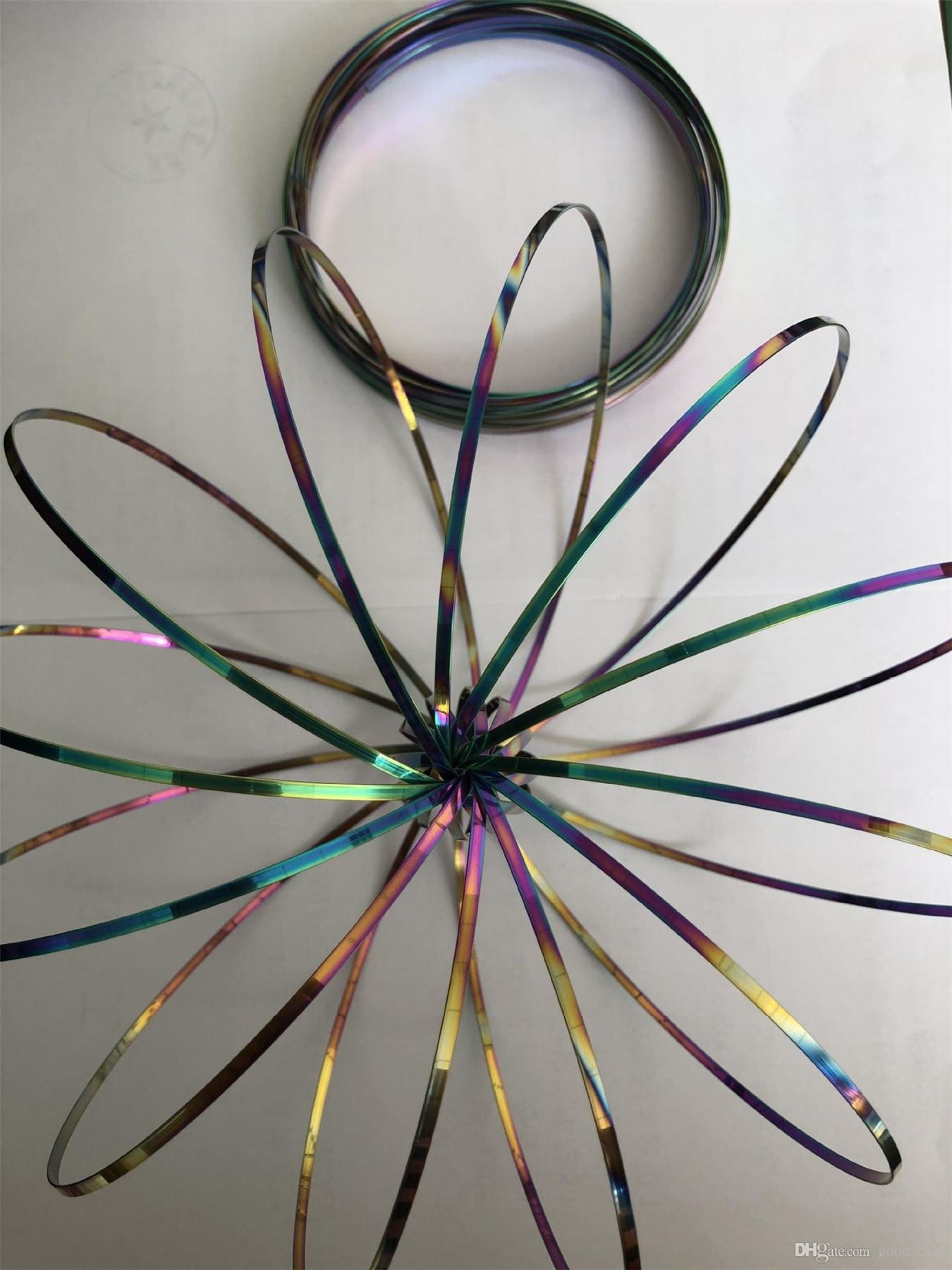 kinetic arm slinky