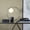 Silver Solid Round 15" x 5" x 18", variant on DecMode 18" Round Gold Table Lamp with White Glass Shade