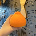 thumbnail image 5 of Juguete para exprimir el alivio del estrés de mandarina | Diseño realista de mandarina fea | Construcción de TPR suave | Alivio de la ansiedad | Fidget y Terapia Sensorial | Tamaño de bolsillo |, 5 of 5