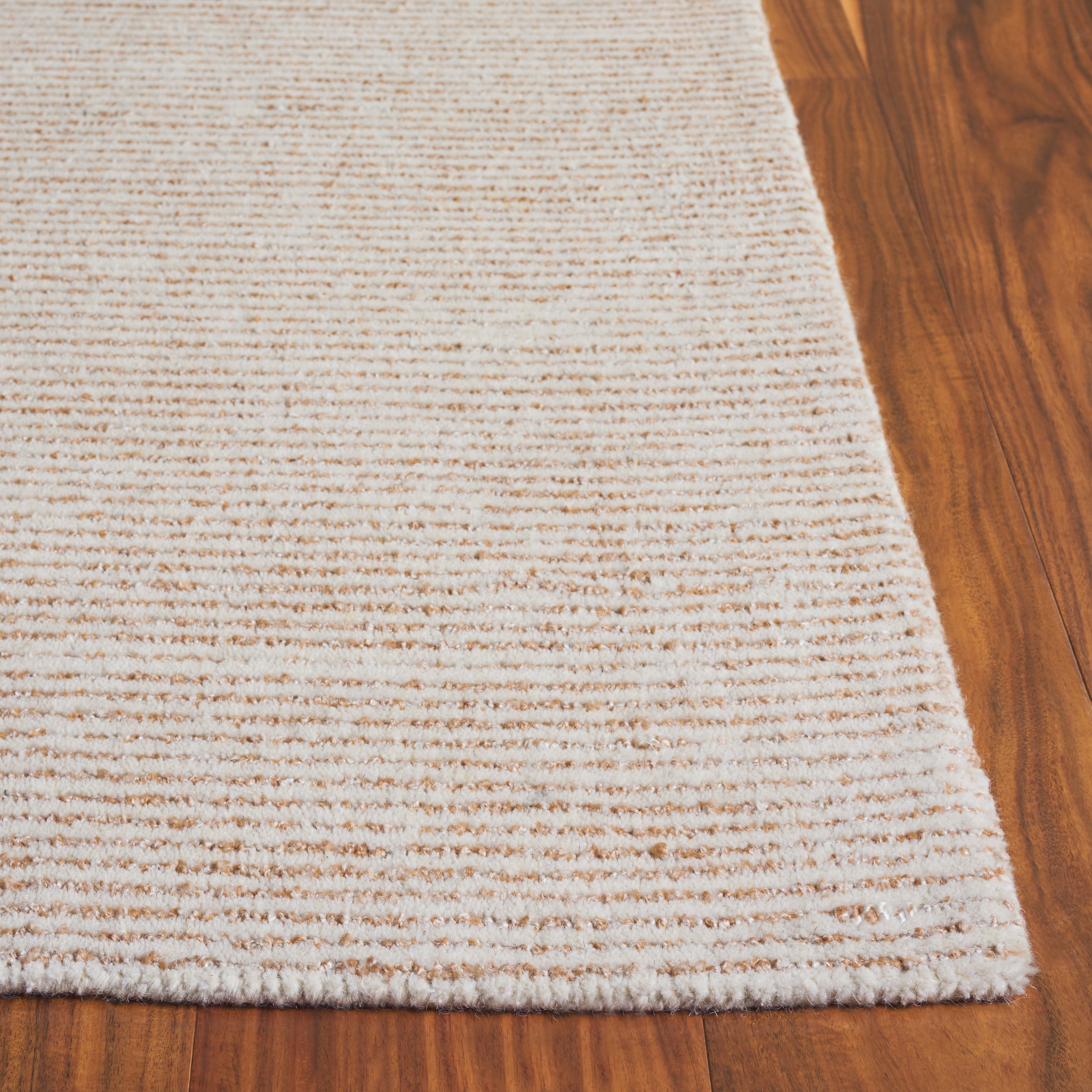 SAFAVIEH Abstract Rumen Solid Color Area Rug, Ivory/Beige, 5' x 8'