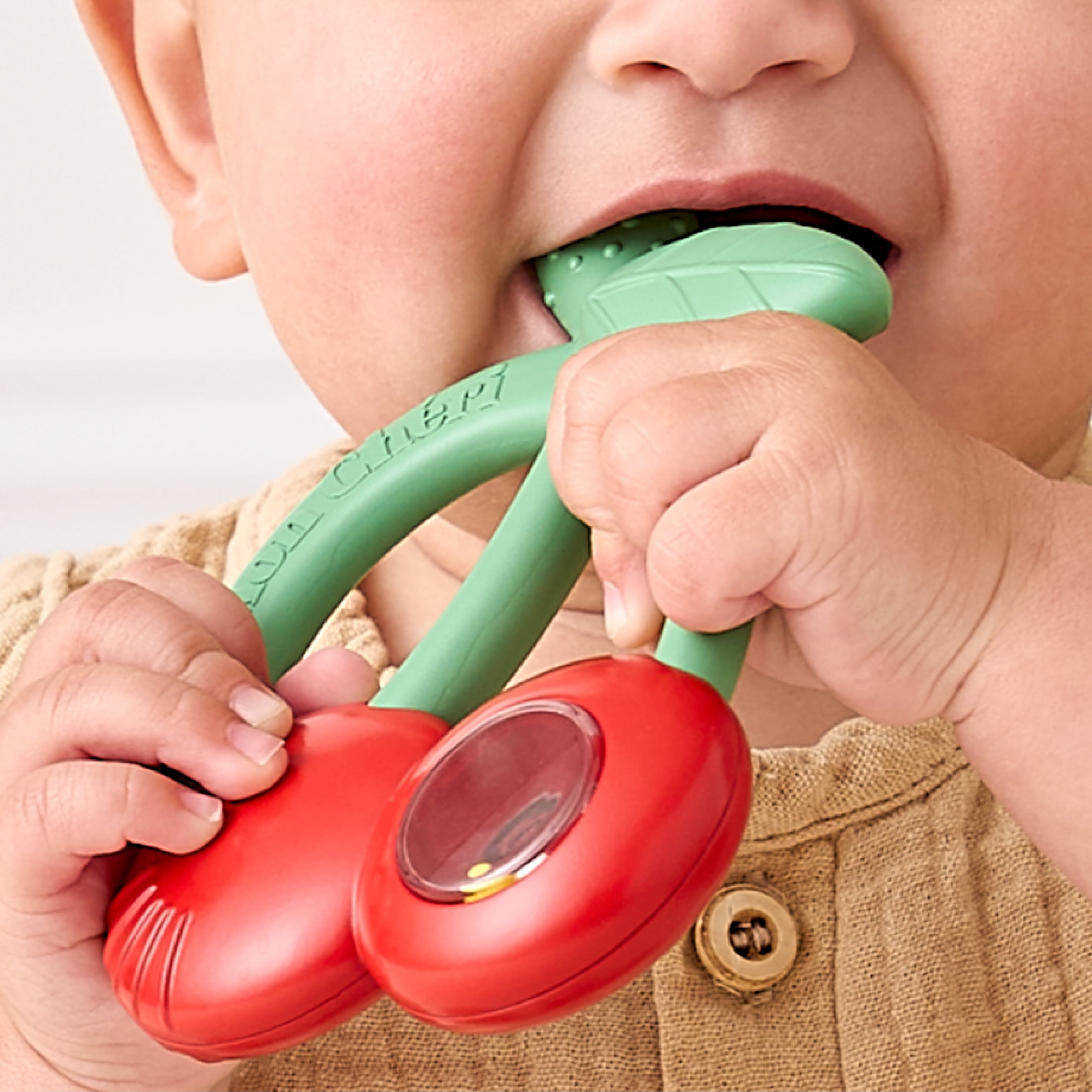 Bitzy Shake™ Cherries silicone teether with rattle