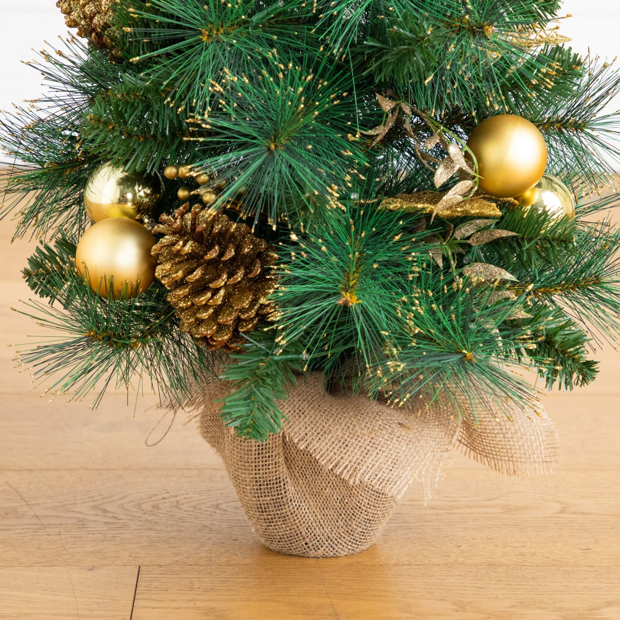 3ft. Artificial Pre-Lit Christmas Tree with Gold Ornaments & Pinecones and 50 LED Lights in Jute Wrapped Base
