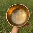 thumbnail image 1 of HLONK Large Golden And Copper Color Chanting Bowl  Handmade Golden And Copper Tibetan Singing Bowl Set  6.69 Inch Diameter Includes Washers And Leather Striking Sticks  Handmade Meditatio, 1 of 7