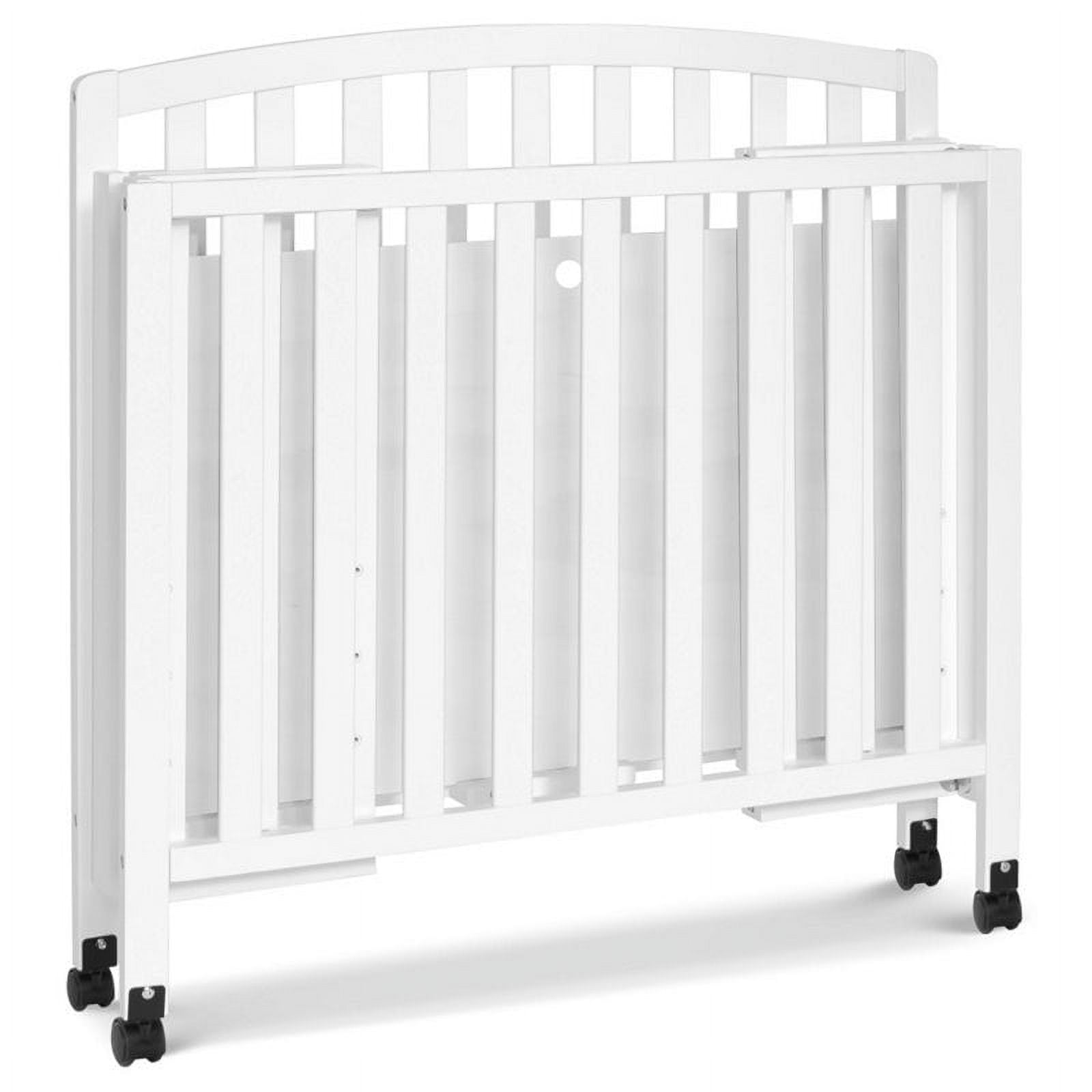 DaVinci Dylan Folding Portable 3-in-1 Mini Crib and Twin Bed in White