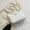 White, variant on Women's Diamond Pattern Chain Shoulder Bag Premium Leather Large Capacity Commuter Handbag with Stylish Metal Chain for Daily Work Shopping and Evening Events White