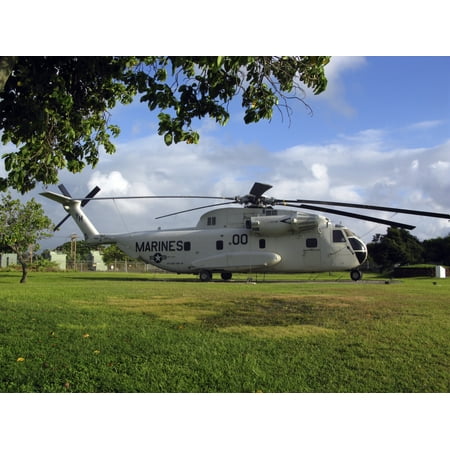 Usmc Helicopter - A USMC CH-53 Sea Stallion heavy lift transport helicopter on display near the entrance of the Marine Corps Air Station Kaneohe Poster Print