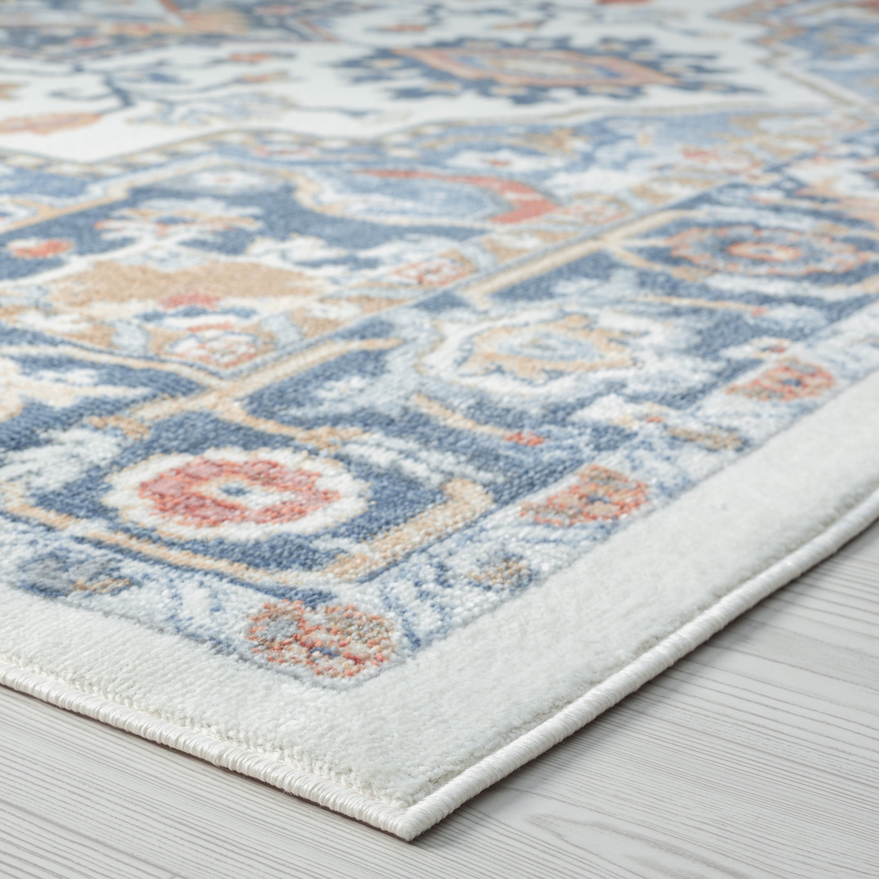 Allure Traditional 5' x 7' Cream and Navy Polypropylene Indoor Area Rug