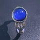 thumbnail image 2 of Anillo de estado de ánimo con cambio de color de piedra lunar de simulación redonda, anillo de piedra preciosa con cambio de color de piedra de temperatura con sentido creativo de moda, anillo de tem, 2 of 5