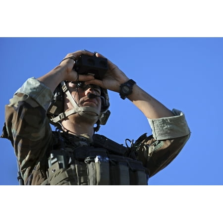 New Look Store Finder US Special Operations soldier looks through a rangefinder Canvas Art - Stocktrek Images (35 x 23) ()