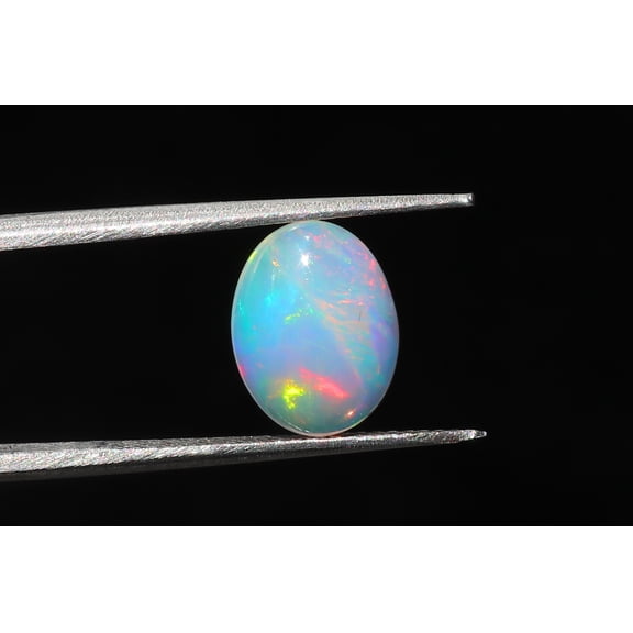 Opal Stone Original Ethiopian Opal very good fleshy fire Shape Oval Size 12.3x9.4x4.5mm Weight 2.25 Cts