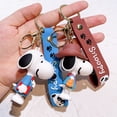 thumbnail image 2 of Snoopy Charlie figura de dibujos animados llavero bolsa colgante lindo epoxi coche llavero decoración llavero pareja colgante regalo de cumpleaños, 2 of 5