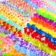 thumbnail image 5 of GOOHOCHY Guirnalda hawaiana de 36 piezas con flores artificiales de colores para el cuello, ideal para fiestas temáticas tropicales de Hawái, bodas, playa, cumpleaños, tamaño pequeño., 5 of 7