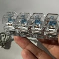 thumbnail image 3 of Mayúsculas Del Teclado Teclado mecánico de juguete antiestrés de 7,5 cm con luces LED azules y llavero, compacto, portátil, para aliviar el estrés, pieza única. Rkxzt, 3 of 6