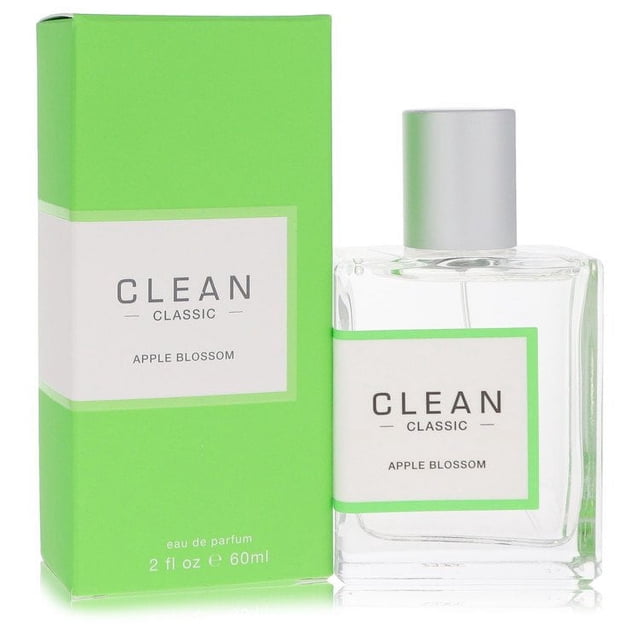 clean classic apple blossom eau de parfum spray by clean clean model botella rectangular de vidrio transparente con etiqueta blanca con borde verde y tapón plateado junto a su caja verde, indicado Apple Blossom, 60 ml.