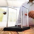 thumbnail image 2 of Newton's Pendulum, Classic Shot Put Pendulum, 5 Balls, Physical Desk Office Decor, Ball Pendulum, Silver, 13.5 x 13.5 x 11.5 cm, 2 of 4