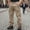 Khaki, variant on BVnarty Men's Solid Corduroy Cargo Long Pants Button Closure Casual Relaxed Fit Vintage Style Trousers with Side Pockets Navy L