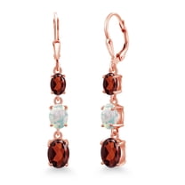 Gem Stone King 18K Rose Gold Plated Silver Red Garnet 3 Stone Dangle Earrings for Women (6.14 Cttw, Gemstone January Birthstone, Oval 8X6MM, 7X5MM and 6X4MM)