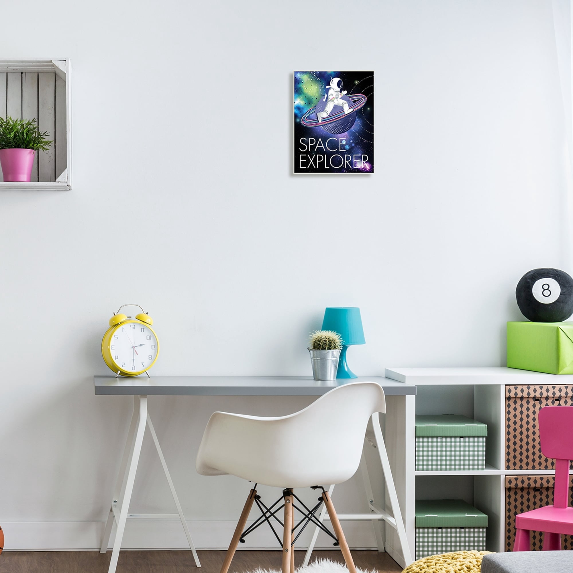 Stupell Industries Space Explorer Starry Universe Astronaut on Galaxy Planet Wood Wall Art, 10 x 15, Design by Jennifer Ellory